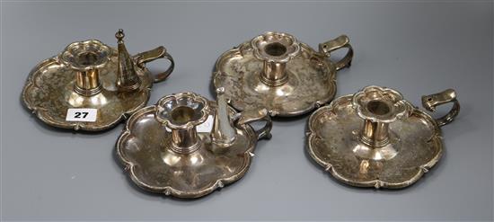 A set of four 19th century cusped rim chambersticks, three with associated snuffers 14.3cm